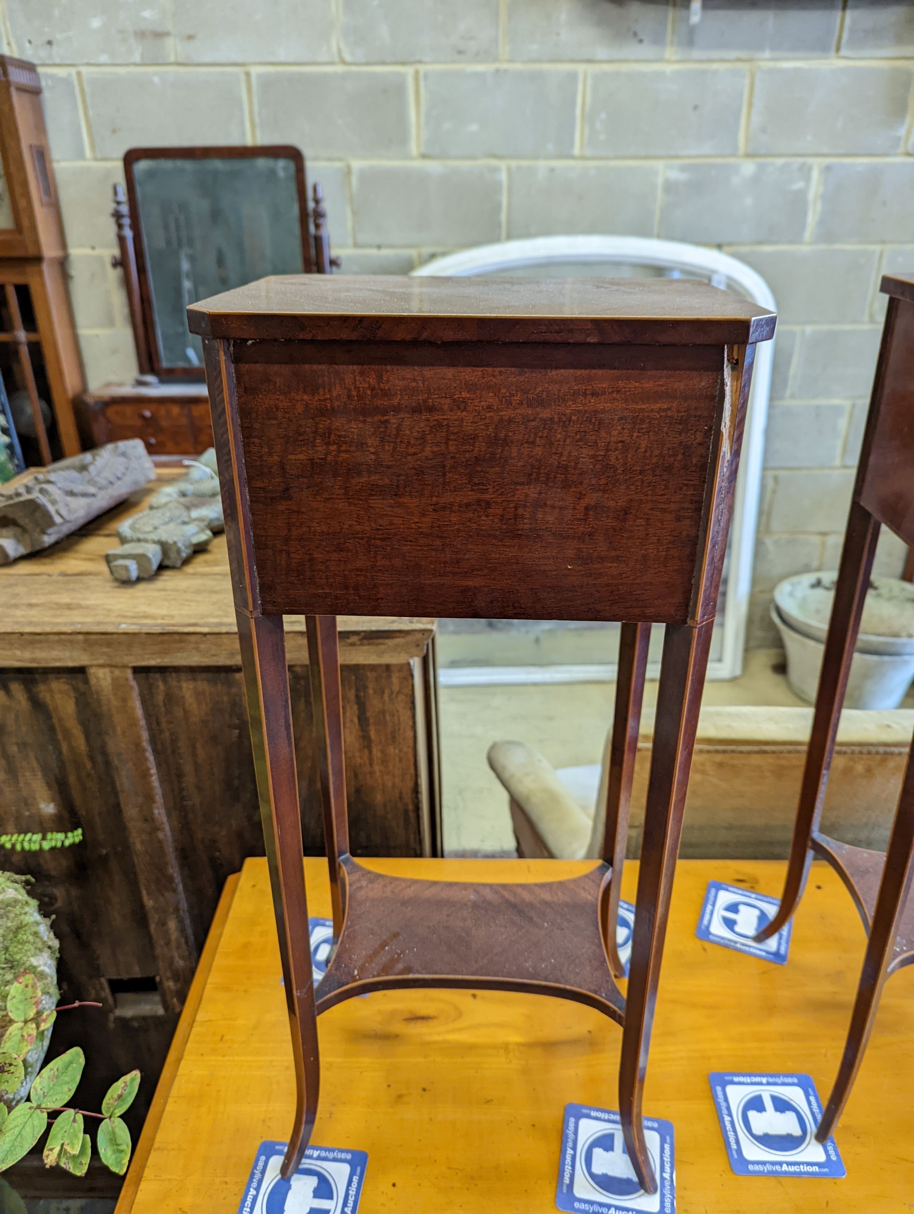 A pair of Sheraton revival inlaid mahogany two drawer bedside tables, width 30cm, height 67cm